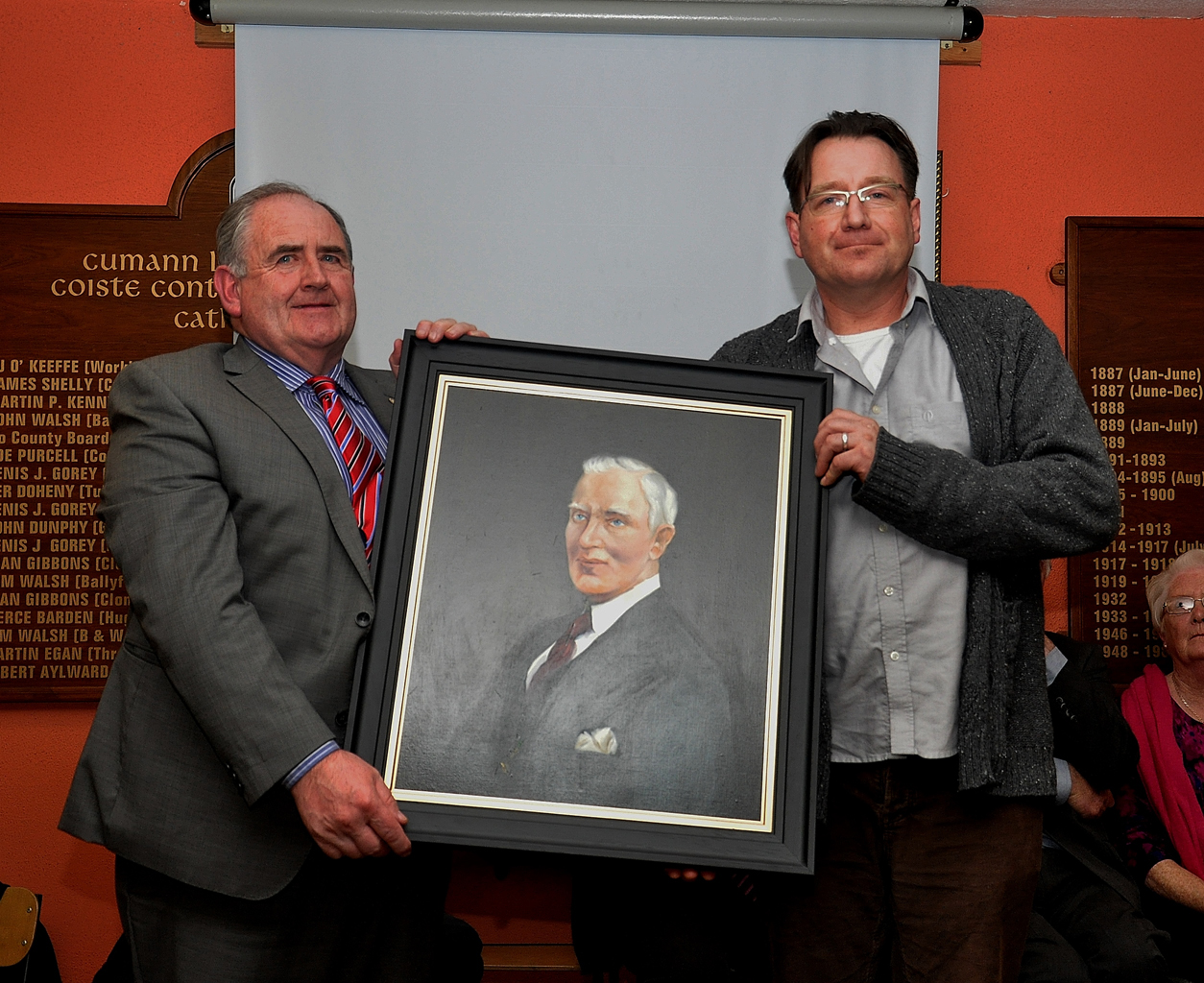 David Nowlan presents Ned Quinn with picture of James Nowlan