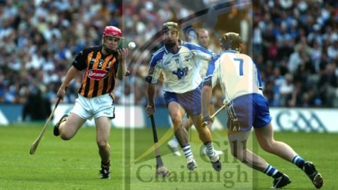 Tommy Walsh (Kilkenny) handpasses the sliotar away under pressure from Jack Kennedy and Kevin Moran (Waterford) the All-Ireland Senior Hurling Final in Croke park. (Photo: Eoin Hennessy)