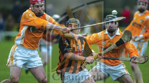 January 2008 Jumping in - Kevin Elliot (Antrim) jumps into clear the sliotar from the possession of Richie Hogan (Kilkenny) during the Walsh Cup clash in Freshford.(Photograph: Eoin Hennessy)