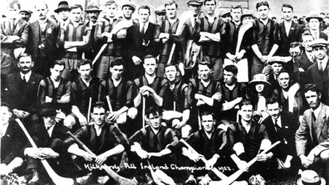 Back Row: Peter Dunne (mascot), Jack Rochford (Trainer), Mick Heffernan (with hat), Players only - Tom Tierney, Bill Brennan, Ned Purcell (official), Eddie Dunphy, Lory Meagher (with cap), Dick Grace, Matty Power, Bill Kenny, Mick Brennan (no jersey). Middle Row: Sean Gibbons, Martin Lalor, Jimmy Tobin, Paddy Donoghue, Watty Dunphy, Mark McDonald, John Holohan, Pat Glendon, Miss Gorey, Tim Scott, Mick Dalton (with cap standing). Front Row: Martin Egan (with hat), Tommy Carroll, Dick Tobin, John Roberts, Pat Aylward, Tom Walsh (Chairman Co. Board with hat on ground).