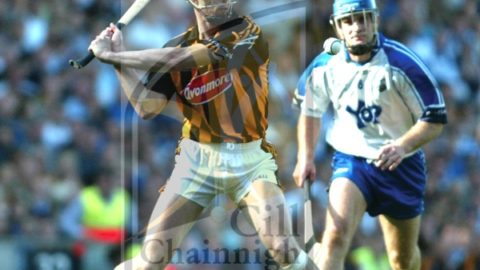 Brian Hogan (Kilkenny) clears the sliotar as Michael 'Brick' Walsh (Waterford) closes in during the All-Ireland Senior Hurling Final in Croke park. (Photo: Eoin Hennessy)